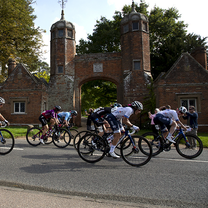 Women’s Tour 2021 - The race passes by the gate house of Melford Hall in Long Melford