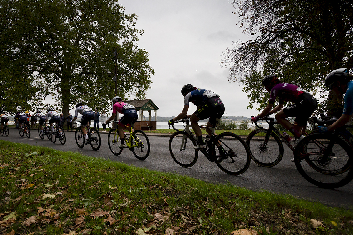 Women’s Tour 2021 - The peloton rides at the side of the River Stour