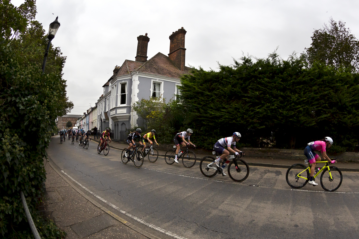 Women’s Tour 2021 - The peloton passes a row of grand houses on its way through Mistley