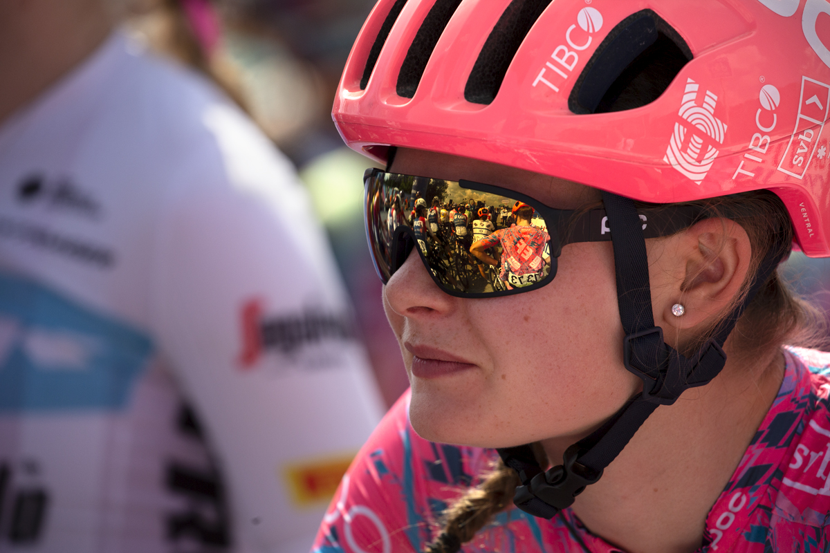 Women’s Tour 2022 - Abi Smith of EF Education-TIBCO-SVB waits for the race to start with her teammate reflected in her glasses