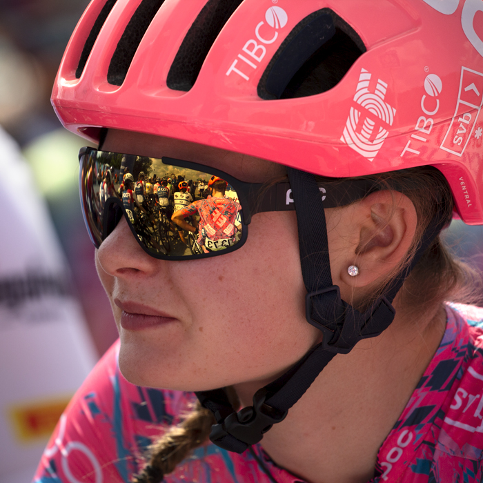 Women’s Tour 2022 - Abi Smith of EF Education-TIBCO-SVB waits for the race to start with her teammate reflected in her glasses