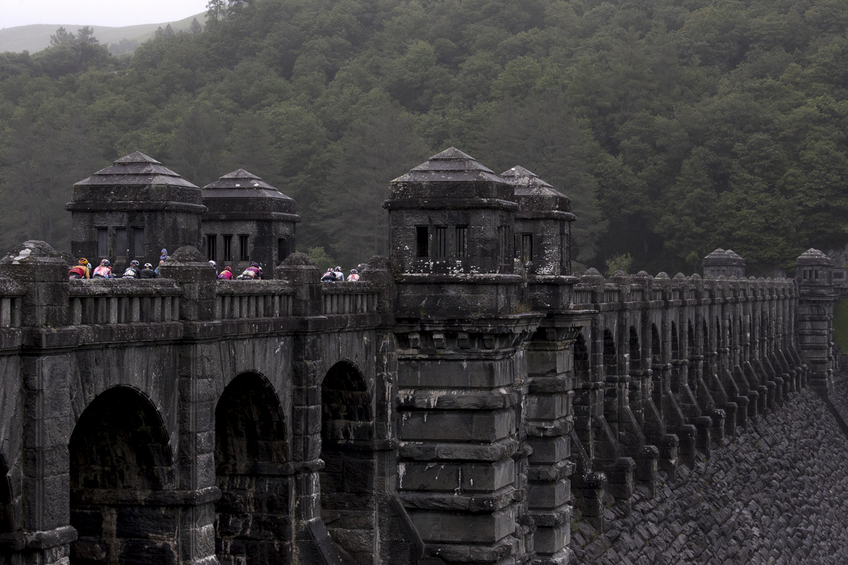 Women’s Tour 2022 - The helmets of the riders can be seen as they pass over the dam at Lake Vyrnwy