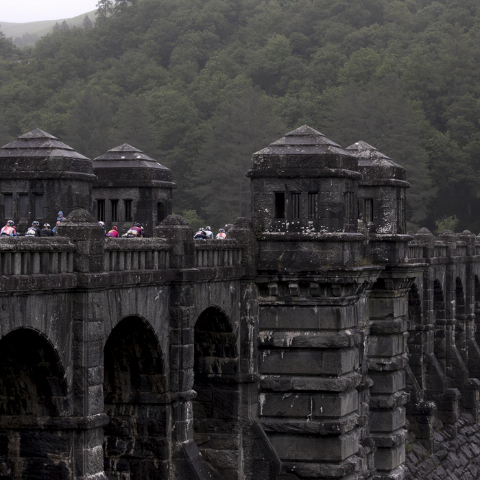 Women’s Tour 2022 - The helmets of the riders can be seen as they pass over the dam at Lake Vyrnwy