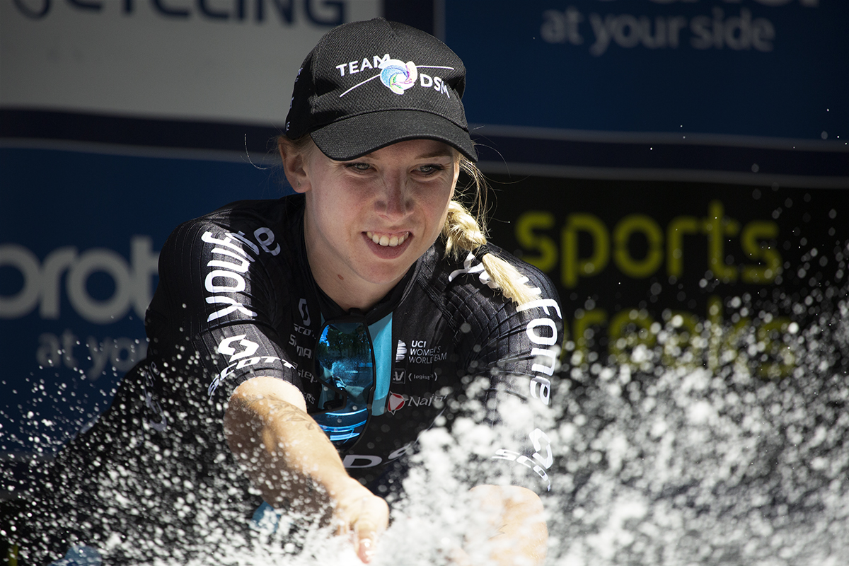 Women’s Tour 2022 - Lorena Wiebes sprays champagne from the podium after winning the final sprint of the race in Oxford