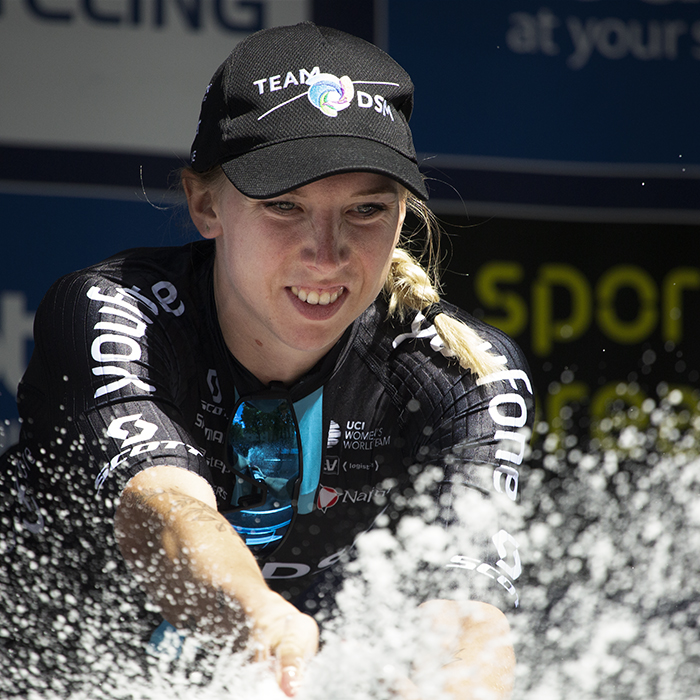 Women’s Tour 2022 - Lorena Wiebes sprays champagne from the podium after winning the final sprint of the race in Oxford